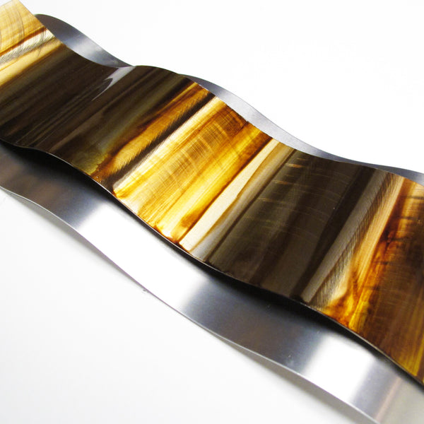 Gold metal wall decor, detail angle view