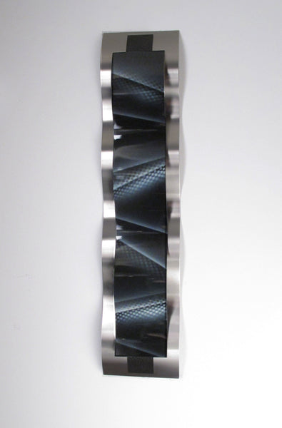 Black wall decor front view of sculpture