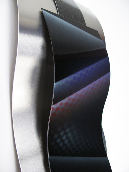 detail view of aluminum wall sculpture