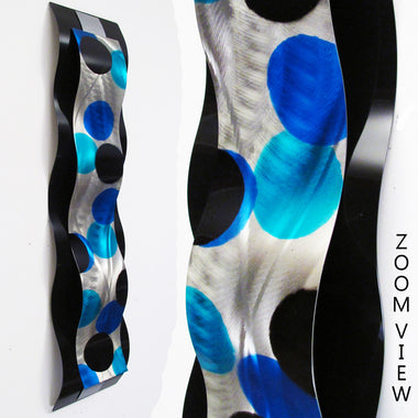 Modern abstract wall sculpture with geometric blue dot design