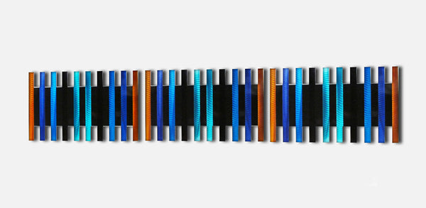 large metal wall sculpture mounted horizontally